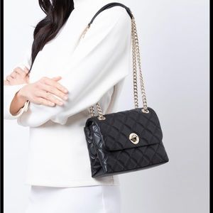 Kate spade quilted leather crossbody bag with gold chain